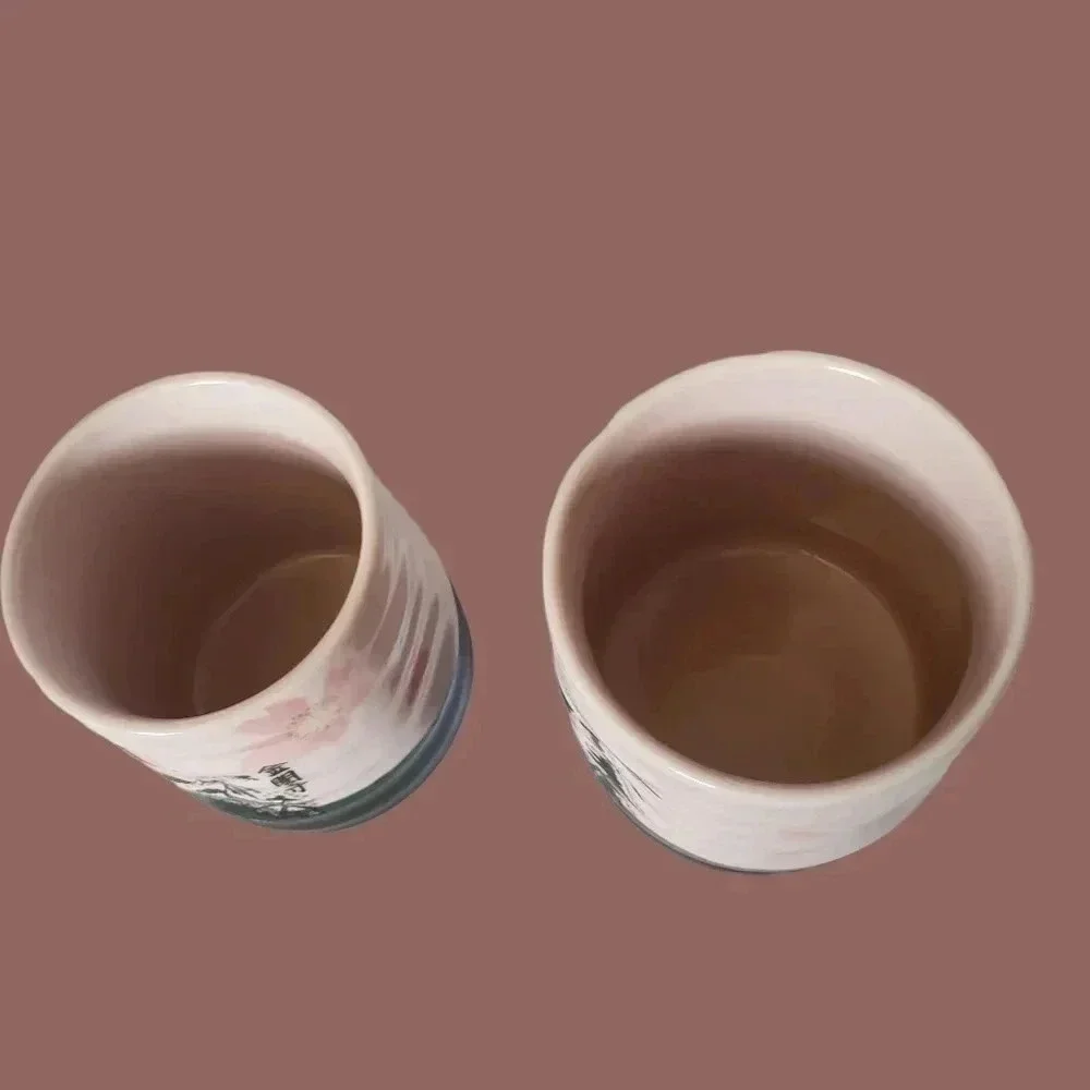 -Tea cup Japanese pottery pink and black